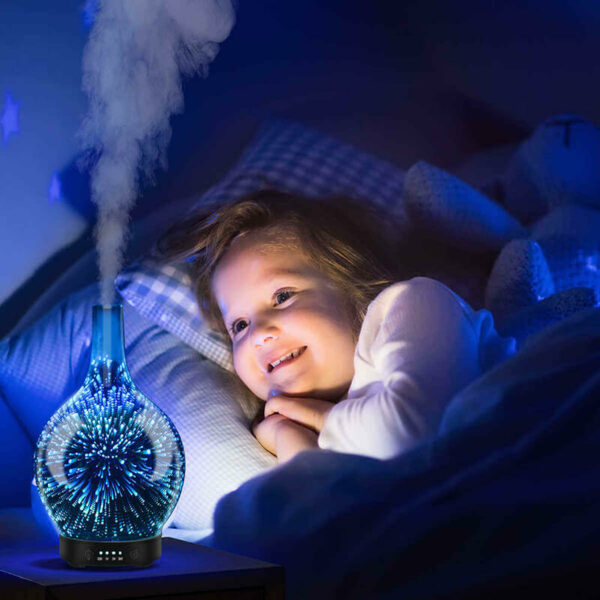 A child sleeping with Beautiful 3D Glass Vase Essential Oil Fragrance Diffuser