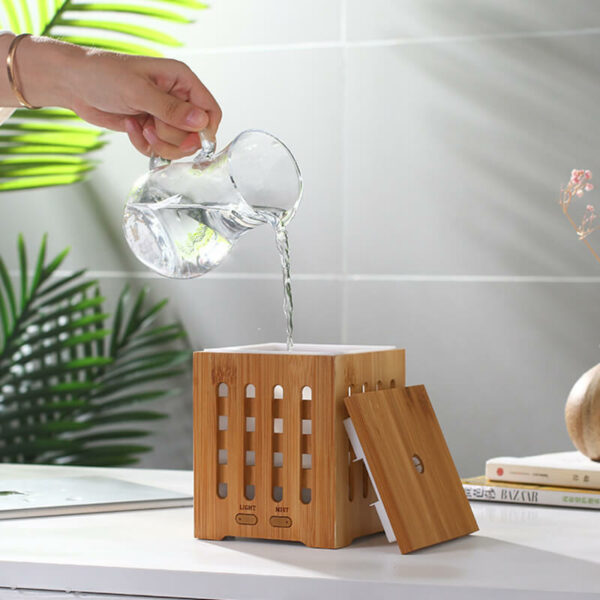 drop water into bamboo aroma diffuser
